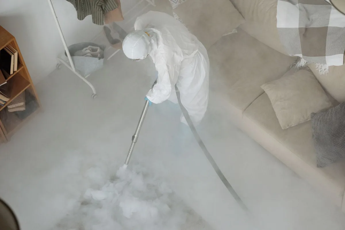 Biohazard cleanup technician in protective equipment, Bryn Mawr-Skyway, WA